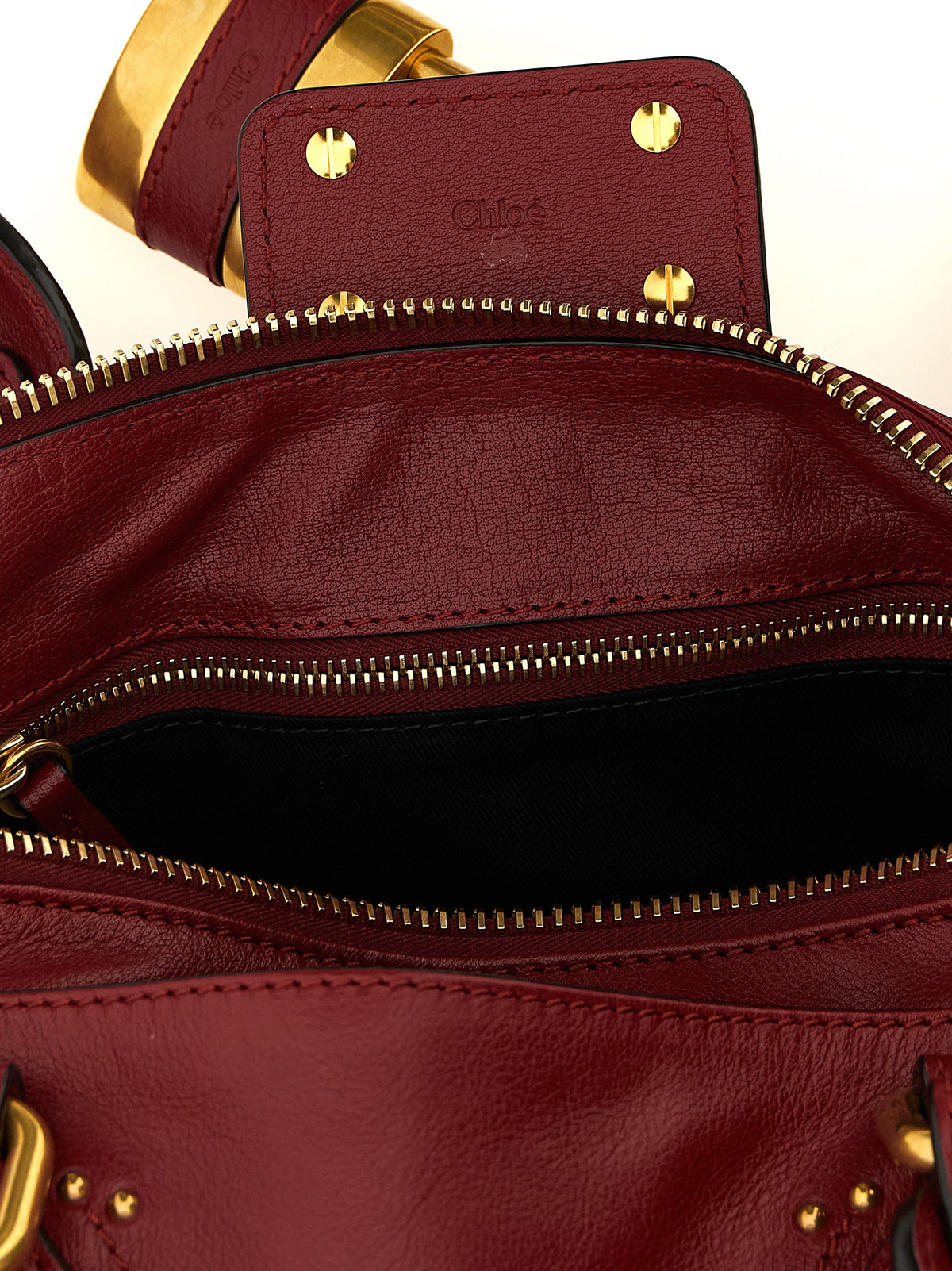 Shoulder bag made of burgundy buffalo leather