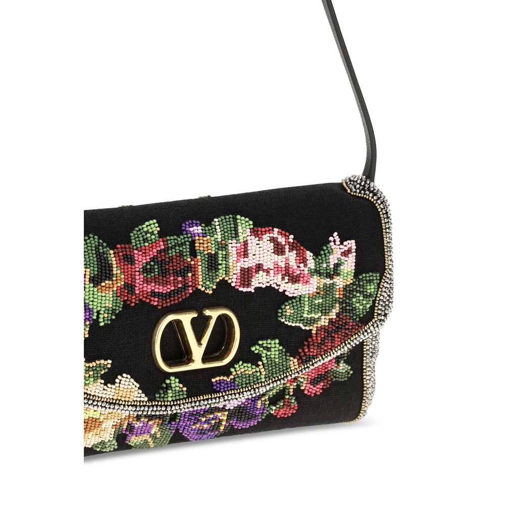 Schwarze Schultertasche aus Satin